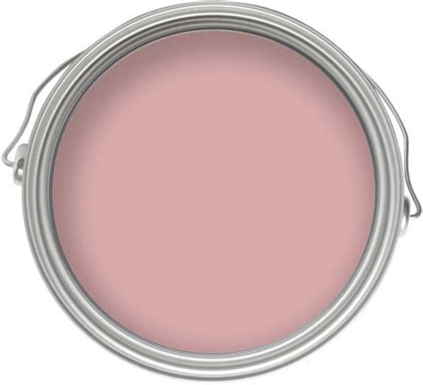 a pink paint can with the lid open