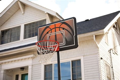 Premium Photo | A basketball hoop with a basketball net on it