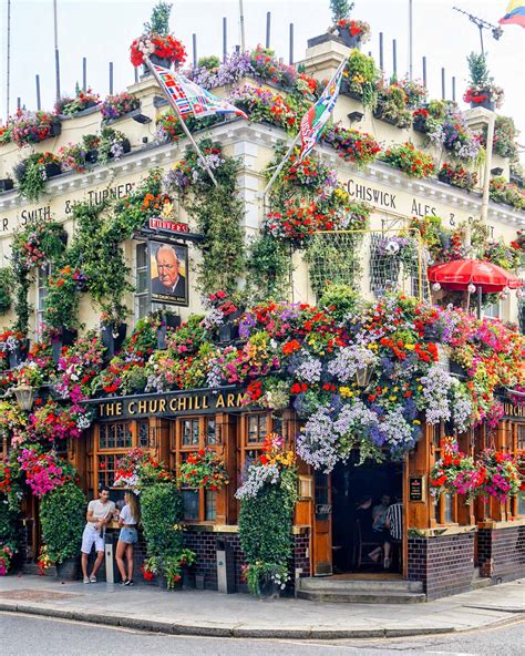 The Churchill Arms Flower & Vine-Covered Façade | Explorest