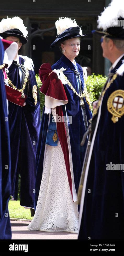 Queen Margrethe II of Denmark, wearing ceremonial robes, attends the Order of the Garter, at ...