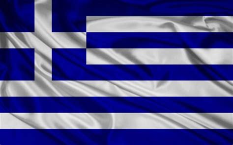 the flag of greece waving in the wind