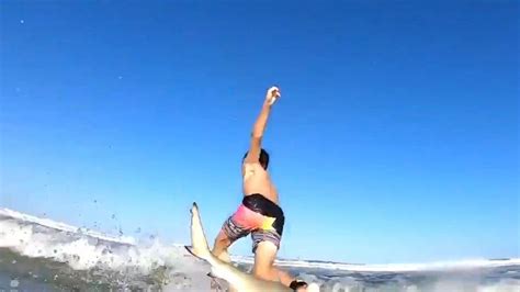 Child surfer takes a tumble, camera catches that he was hit by a shark ...