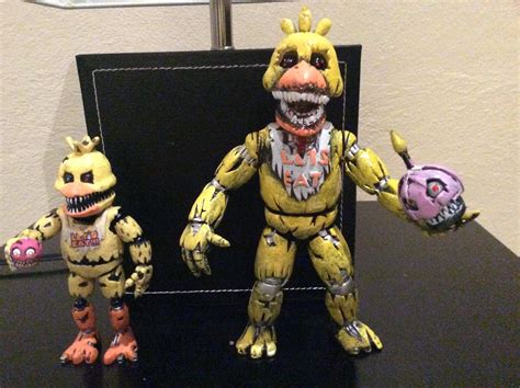 official nightmare chica vs bootleg nightmare chica : r/fivenightsatfreddys