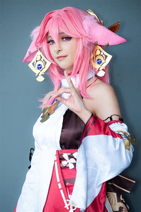 Female Cosplayer in a Pink Anime Costume Wearing Pink Hair Stock Photo - Image of exuberant ...