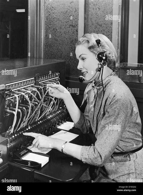 Telephone operator working at switchboard Stock Photo - Alamy