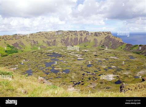 View of Rano Kau volcano at Easter island, showing a gap at the southern end of the crater wall ...