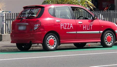 'Looking slick': Hell Pizza pays out Pizza Hut for terrible delivery driver signage | Newshub