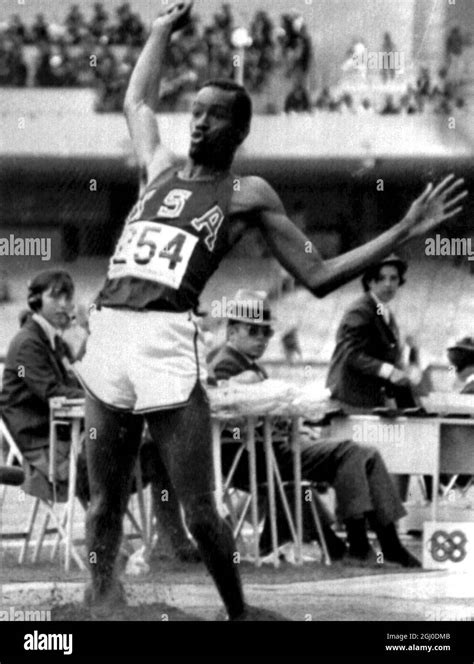 1968 Olympics, Mexico. Bob Beamon of the USA in action during the men's long jump event in which ...