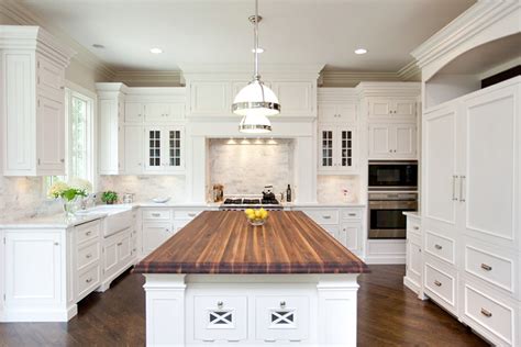 The Granite Gurus: Whiteout Wednesday: 5 White Kitchens with Wood Topped Islands