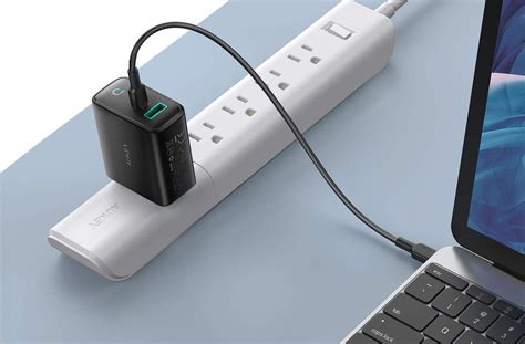 This $15 all-in-one adapter can charge your phone, laptop, and ...