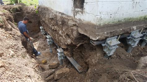 Foundation Repair - Sinking Foundation Supported with Helical Piers in Red Wing, MN ...