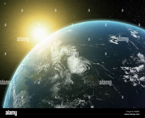 Sunset over Earth Stock Photo - Alamy