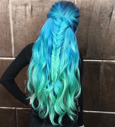 Braided Hairstyle in blue and green colors More at www.hairchalk.co #haircolor #hairdye # ...