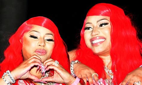 Nicki Minaj shows off new red hair at the Trinidad carnival