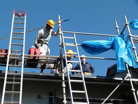 Solar installation workers, lift, and ladder P1000590 | Flickr