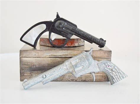 Pair Vintage Toy Guns Cap Gun Ornate Silver Metal by mothrasue