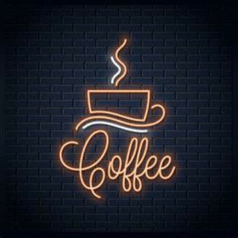 Coffee Cup Neon Sign on Brick Wall Background