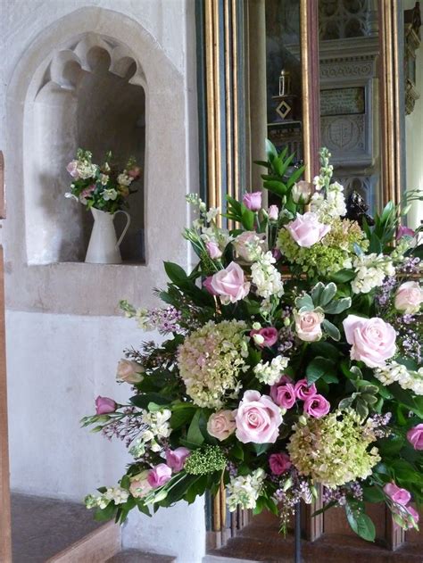 Vintage church flowers in Wellow, Bath. I like the jug in the niche ...