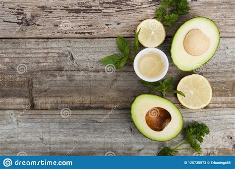 Fresh Avocado Fruit on a Wooden Rustic Board. the Concept of Healthy Eating. Food Photography ...