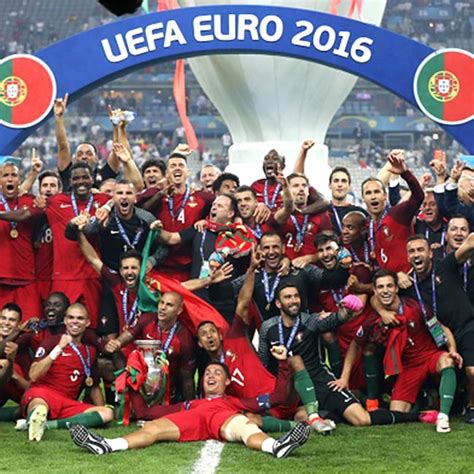 Portugal teammates posing with EURO 2016 trophy after winning EURO 2016 ...