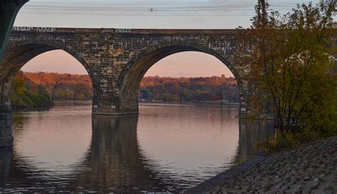 Schuylkill River Railroad Bridge in Autumn Photograph by Bill Cannon | Fine Art America