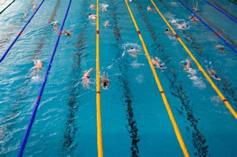 Premium Photo | Competitive swimming in the pool during training