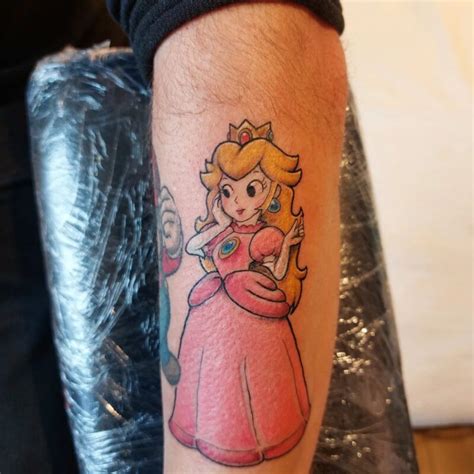 21 Princess Peach Tattoos To Showcase Your Love Of Mario • Body Artifact