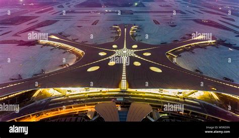 The Beijing Daxing International Airport is illuminated by light ...