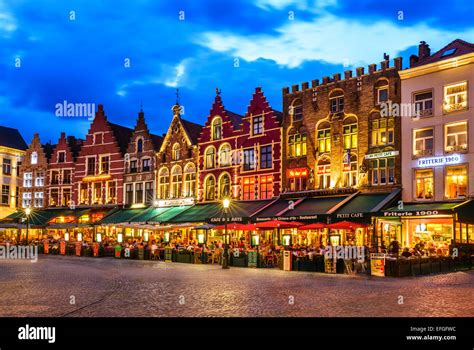 Bruges, Belgium. Night image north side of Grote Markt (Markt) with ...