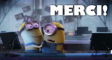 Merci! GIF - Merci Minions Hug - Discover & Share GIFs