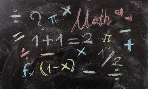 Premium Photo | Math equations and symbols isolated on blackboard background