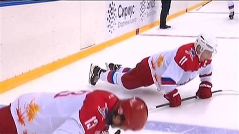 Vladimir Putin does press-ups at ice hockey practice | World News | Sky News