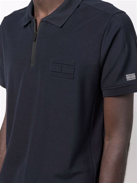 Tommy Hilfiger embossed-logo Polo Shirt | Blue | FARFETCH