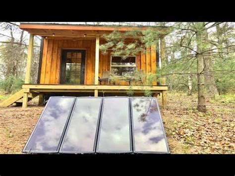 Off grid tiny cabin gets harbor freight solar panel kit installation and I wire 12 /110 volt ...