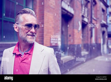 Man walking away suit hi-res stock photography and images - Alamy