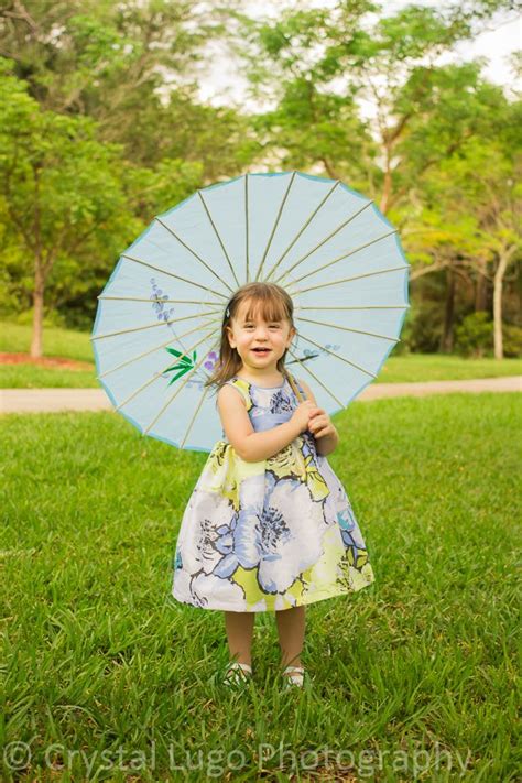 Toddler girl in park with parasol - Photo by Crystal Lugo Photography ...