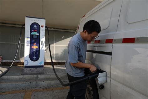 China charges ahead for green development as NEV charging piles boom ...