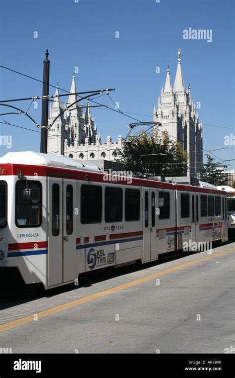 UTA TRAX light rail train on Main Street Salt Lake City with Tabernacle in Temple Square October ...