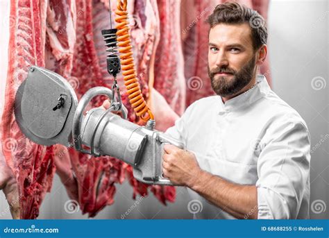 Butcher Cutting Pork at the Manufacturing Stock Image - Image of industry, production: 68688255