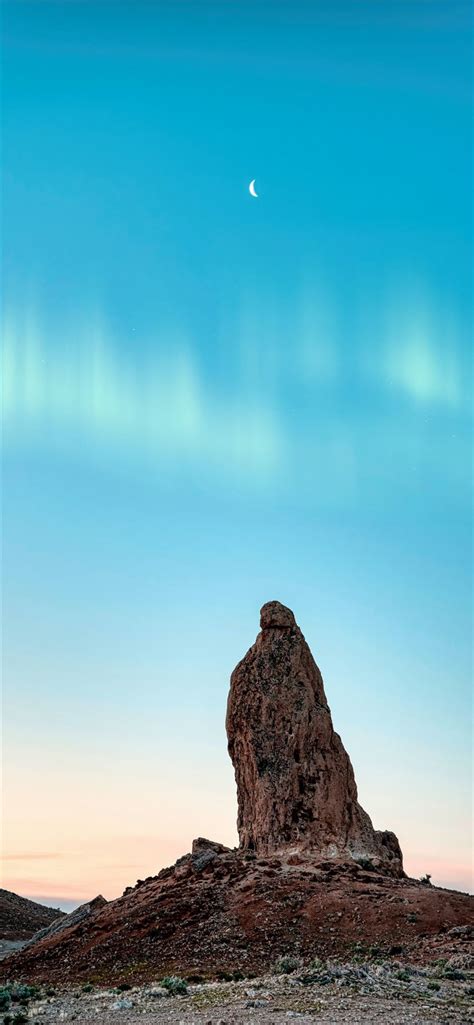 brown rock formation under blue sky during daytime iPhone 11 Wallpapers Free Download