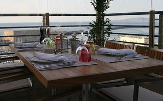 Dining table overlooking the harbour - Herkalion, Crete | Flickr