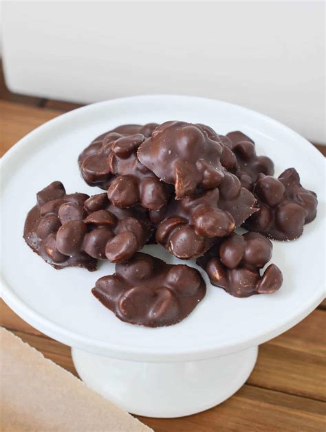 Chocolate Covered Macadamia Nuts on plate - 24 Carrot Kitchen - 24 Carrot Kitchen