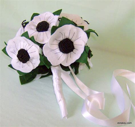 A Winters Tale elegant white poppy bridal bouquet