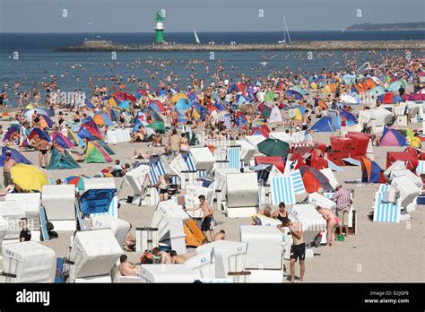 Rostock-Warnemuende, Germany, many tourists on the beach Stock Photo - Alamy