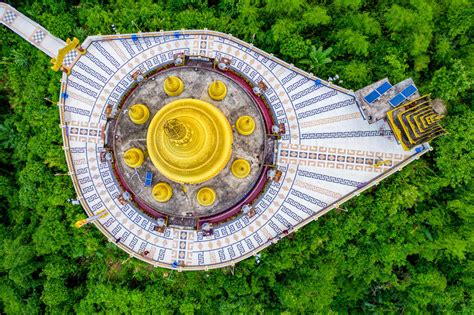 Aerial view of Bandarban, a golden buddhist temple with golden dome and ...