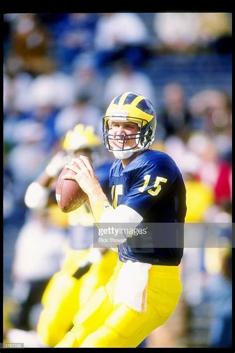 Quarterback Elvis Grbac of the Michigan Wolverines prepares to pass... News Photo - Getty Images