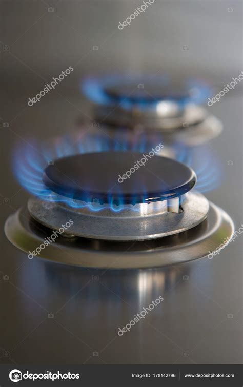 Two Gas Hobs Blue Fire Stock Photo by ©ImageSource 178142796