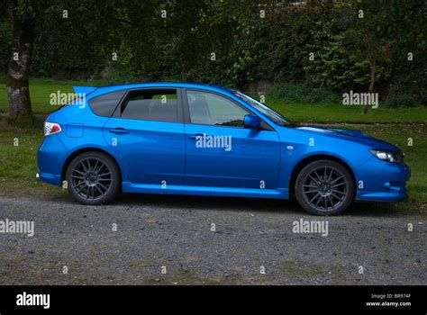 Metallic blue subaru impreza wrxs hatchback hi-res stock photography ...