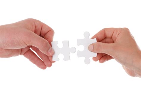 Hands Holding Jigsaw Free Stock Photo - Public Domain Pictures
