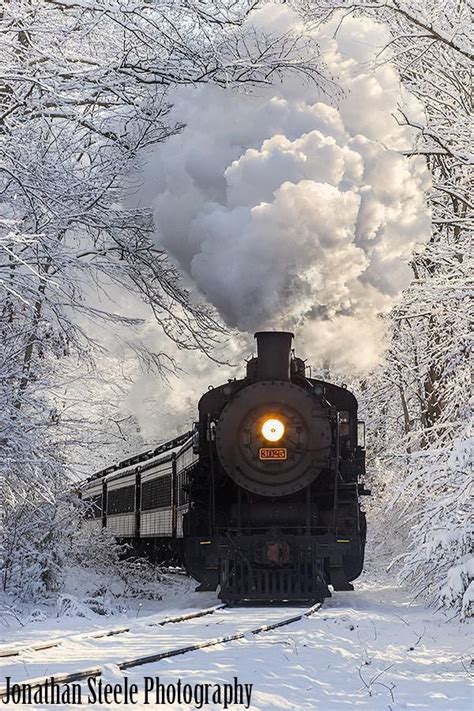 First run after the snow. Essex Steam Train's engine 3025 rounding the bend leading into the Old ...